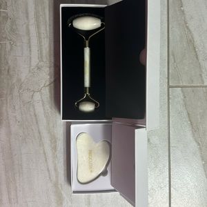 Neocutis face roller and guasha tools . Brand new never used .